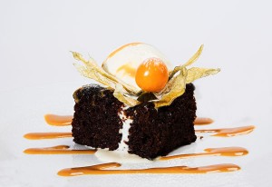 Warm Sticky Date Pudding with Cream and Butterscotch Sauce