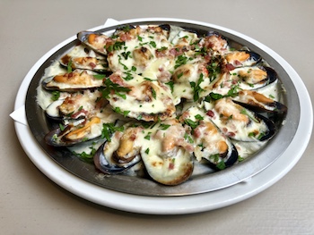 Chef's mussel and queen scallop platter with gruyere cheese sauce and crispy bacon